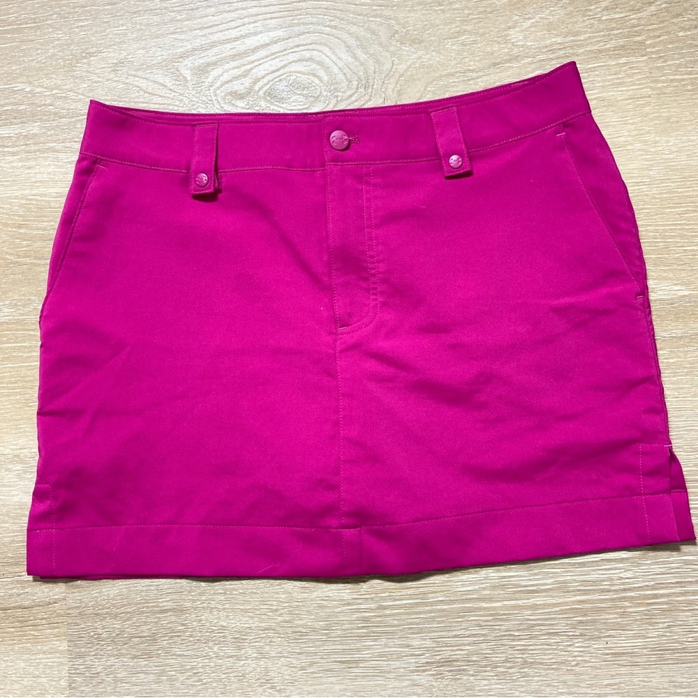 Under Armour Bright Pink Skort Skirt. Golf or tennis skirt with shorts size 8